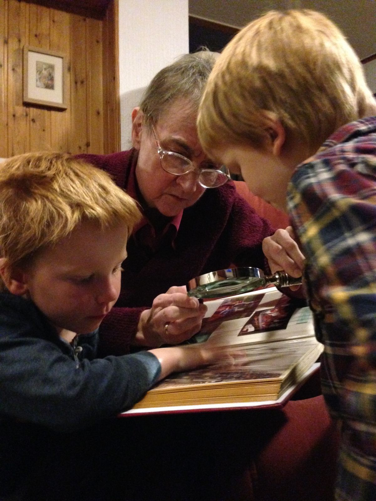 For a few days each year we can give ourselves the license to talk about our memories of those who have died.  Share photo albums with your grandchildren…  (Photo: Rebecca Patterson)